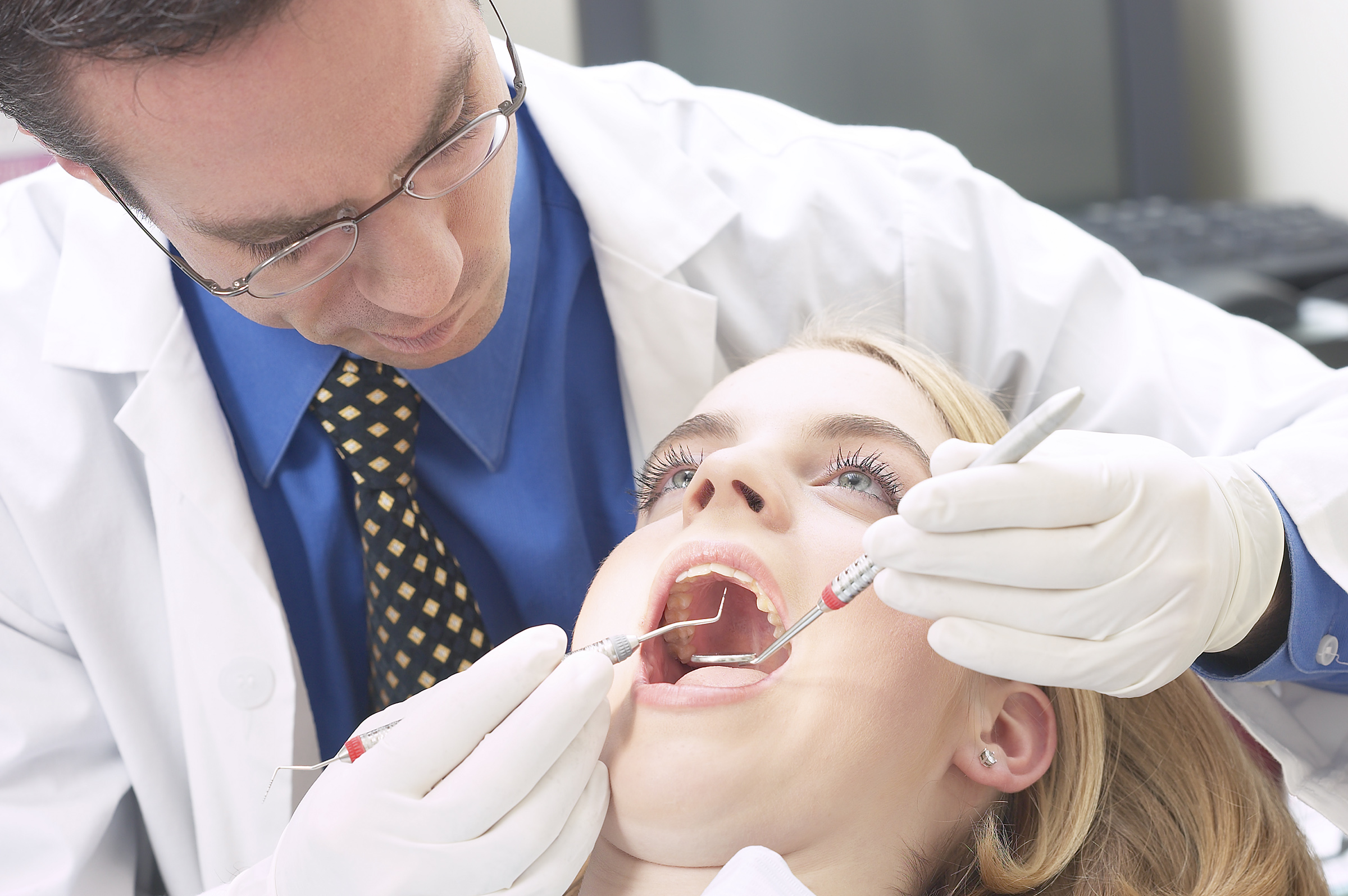 Doctor operating on a patient